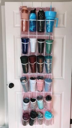 Organizing Tumbler Cups, To Go Cup Organization, Tumblr Cup Storage Ideas, Organization For Storage Room, Starbucks Cup Organizer, How To Store Yeti Cups In Kitchen, Tumbler Storage Ideas Kitchen, Travel Cup Storage Ideas, Starbucks Cups Organization Ideas