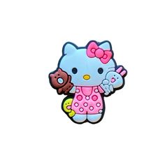 a hello kitty pin with a teddy bear