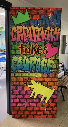 a sign that says creativity takes garage to the next level in front of a brick wall