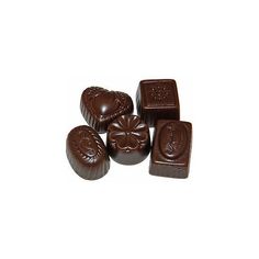 five chocolates with carved designs on them