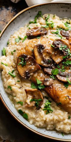 a white plate topped with rice and mushrooms