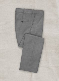 Make a sartorial impression at the office or your next formal gathering with our Loro Piana Esteba Wool Pants. Crafted from Pure New Zealand Merino Wool with a natural stretch, the gray pants are perfect for wearing throughout the year by adding a modern and refined touch to your timeless look. The pants are all about elegance and versatility making for an excellent option to have in your wardrobe rotation. 
 
Choice of the Elite, Loro Piana is owned by LVMH Moët Hennessy Louis Vuitton SE, the F Elegant Gray Suits With Pockets, Elegant Gray Wool Pants, Elegant Gray Wool Bottoms, Elegant Ankle-length Gray Bottoms, Classic Gray Dress Pants With Pockets, Elegant Gray Ankle-length Bottoms, Elegant Gray Ankle-length Pants, Elegant Flat Front Pants With Pockets, Classic Gray Slim Fit Bottoms