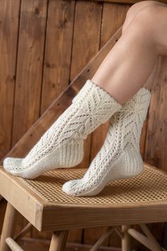 "Hand knitted white socks are inspired by minimalist Scandinavian style. Nordic ornaments, organic wool will keep your feet nice & warm. Natural wool yarns socks designed to be worn with shoes and boots. Ideal to wear during active outdoor time while walking, hiking. Durability Ideal for chilly autumn, winter weather. Hand knitted of 100% natural sheep wool. +𝑨𝒅𝒅𝒊𝒕𝒊𝒐𝒏𝒂𝒍𝒍𝒚 𝑰 𝒂𝒎 𝒂𝒅𝒅𝒊𝒏𝒈 𝒍𝒊𝒏𝒆𝒏 𝒃𝒂𝒈 𝒇𝒐𝒓 𝒑𝒓𝒐𝒕𝒆𝒄𝒕𝒊𝒏𝒈 𝒘𝒉𝒊𝒍𝒆 𝒊𝒕 𝒊𝒔 \"𝒓𝒆𝒔𝒕𝒊𝒏𝒈\" 𝒇𝒐𝒓 Long Knitted Socks, Comfortable Knitted Cream Socks, Comfortable Cream Knitted Socks, Comfortable Knitted White Socks, Comfortable White Knitted Socks, Comfortable Warm White Knee-high Socks, White Knitted Socks For Winter, White Knitted Winter Socks, Casual White Knitted Socks