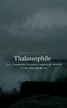 the words thalasophie are written in front of a body of water