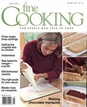 the cover of cooking magazine with an image of a woman cutting cake