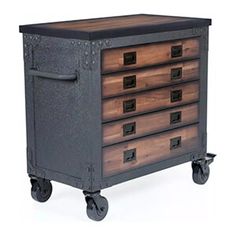 an industrial style wooden and metal cabinet on casteors, with four drawers in the middle