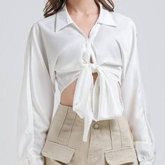 Discover Timeless Elegance with Our V-Neck Crop Blouse Step into a world of classic style and contemporary charm with our Elegant Vintage V-Neck Long Sleeve Crop Blouse. Designed for the fashion-forward woman, this chic, casual white shirt is a perfect blend of elegance and comfort. Its versatile design makes it a must-have addition to your wardrobe, suitable for various occasions across summer, autumn, and spring. Features That Set It Apart Our crop blouse boasts a range of features that cater Casual White Shirt, Blouse Designed, Chic Casual, Long Sleeve Crop, Crop Blouse, New Wardrobe, Ladies Tops Fashion, White Shirt, Classic Looks