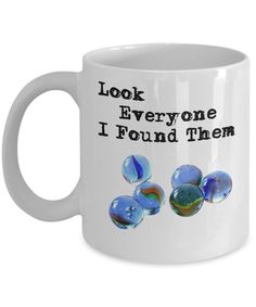 a coffee mug that says, look everyone i found them