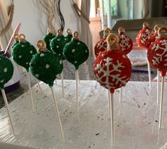 christmas cake pops with snowflakes on them are ready to be served for guests