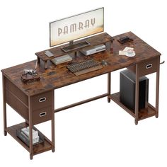 a computer desk with a monitor, keyboard and mouse on it that says pamray