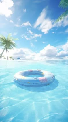 an inflatable raft floating on the ocean with palm trees