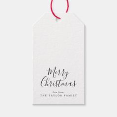 a christmas gift tag with the words merry christmas on it