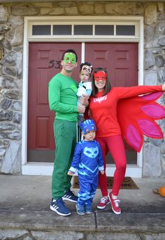 a family dressed up in costumes for halloween