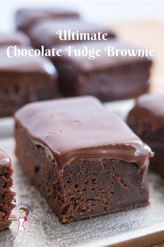 chocolate fudge brownies are on a plate with the words dark chocolate fudge