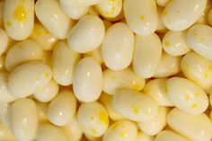 close up view of yellow and white beans