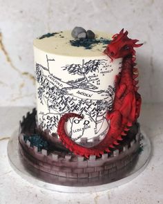 there is a cake that looks like a dragon