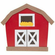 a paper cut out of a red barn with a yellow bun on it's roof