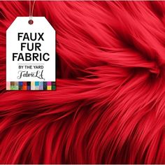 red fur with a tag that says faux fur fabric by the yard available in multiple colors