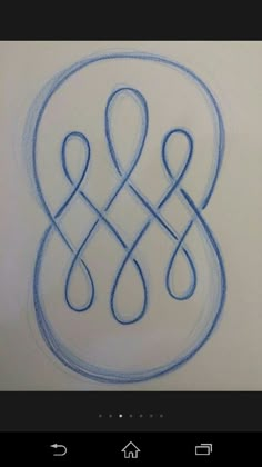 an image of a drawing on paper with blue lines in the shape of two hearts