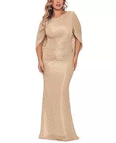 a woman in a gold dress standing on a white background with her hands on her hips