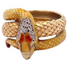 This Masriera Enamel Snake ring is very special. Masriera is known for there Enamel and Plique a Jour pieces. This is designed in the Art Nouveau revival style. This ring features a textured body that resemble snake scales and is done in a highly polished enamel. There is a bit of enamel loss not really noticeable on the head but otherwise it is special. The enamel is done in pale tones of yellow and orange with 13 bead set single cut Diamonds weighing .070 carats. The ring also has a bit of ena Art Nouveau Revival, Plique A Jour, Jewelry Rings Unique, Snake Scales, Ring Photography, Art Nouveau Ring, Vintage Jewelry Antique, Ring Trends, Bead Set