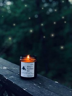 a candle sitting on top of a wooden table