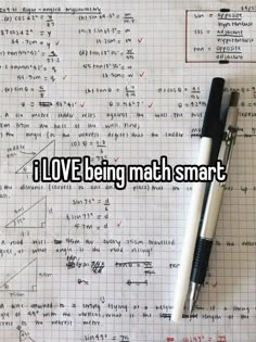 a pen sitting on top of a piece of paper that says i love being math smart