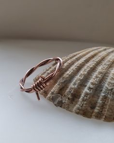 Natrual copper stacker, thumb, finger ring, copper is said to help with arthritis, pretty tone warm colour much like rose gold, solid chunky ring copper may make your finger discloured, it is harmless and washes off  This ring is made from  two strands solid pure copper wire shape and formed round a ring manderel, then soldered,  filed tumbeled and polished, this ring is made from two strands each 1.25 thick, copper is said to help with arthritis,  this barbwire style is very fashionable,   trea Chunky Wire Rings, Unique Gold Copper Rings, Copper Open Ring Jewelry, Hammered Copper Ring, Adjustable Copper Metal Ring Jewelry, Handmade Copper Open Ring, Chunky Rings, Silver Line, Wire Rings