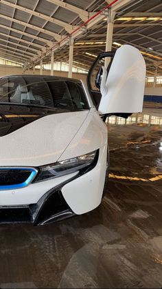 an electric car is parked in a garage