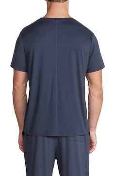 Lightweight and exceptionally soft, this stretchy T-shirt makes a great choice for the gym, a relaxing afternoon or a night of sweet, sweet slumber. Crewneck Short sleeves 91% polyester, 9% spandex Machine wash, tumble dry Imported Moisture-wicking Stretch T-shirt For Loungewear, Stretch T-shirt For Loungewear With Short Sleeves, Blue Stretch T-shirt For Loungewear, Casual Relaxed Fit Tops For Lounging, Casual Crew Neck Top With Moisture-wicking, Casual Tops With Relaxed Fit For Lounging, Athleisure Short Sleeve Tops For Loungewear, Short Sleeve Tops For Loungewear In Athleisure Style, Sporty Soft-washed T-shirt For Loungewear