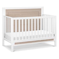 a white crib with wooden slats and no mattresses on the bottom bed