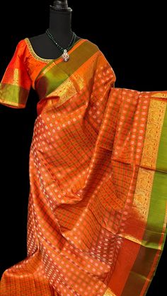 Expertly handwoven with pure ayiram pattu kanchi silk, this brocade saree boasts intricate craftsmanship and vibrant orange hues. Elevate your bridal ensemble with the luxurious feel and stunning design of this kanchi pattu saree, perfect for any special occasion.Pure zari Bridal orange  kanchi pattu saree heavy pallu Brocade saree  kanchi pattu saree with heavy pallu  - CUstom blouse measurements Sarees come done with fall and pico  BLOUSE : Stitched at 36 goes upto 42/43 inches   Pure kanjivaram silk saree with heavy pallu   pure zari kanjivaram saree usa kanchipuram silk saree online shopping usa pure kanchi pattu sarees online usa,bridal silk saree online shopping ,bridal silks online shopping with price, latest collections pattu sarees online, Indian clothing sites usa ,South Indian s Orange Tussar Silk Saree With Zari Weaving, Orange Tussar Silk Saree With Pallu, Orange Saree With Zari Weaving Traditional Drape, Orange Tissue Silk Dupatta For Festivals, Orange Traditional Wear With Zari Weaving For Festivals, Orange Saree With Zari Weaving, Orange Traditional Wear With Meenakari, Festive Orange Saree With Zari Weaving, Orange Meenakari Traditional Wear