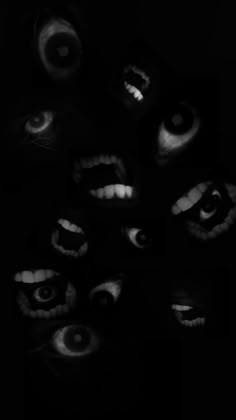 black and white photograph of creepy eyes in the dark