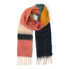 It’s sunshine in a scarf—warm, cozy and colorful! This thick brushed knit scarf from Britt’s Knits® is oversized and ultra cozy, perfect for adding a warm pop of color on a chilly day. 4 Mediterranean-inspired colors: orange, navy, ivory, purple Oversized style with twist fringe.Ultra-cozy, thick brushed knit.Approximately 20" x 14.5" x 10.25". 55% Polyester, 45% Acrylic. Navy Blanket, Winter Wrap, Cozy Scarf, Orange Plaid, Oversized Scarf, Fringe Scarf, Oversized Style, Blanket Scarf, Winter Accessories