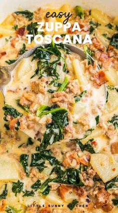 an easy zuppa toscana recipe with spinach and sausage in a white casserole dish