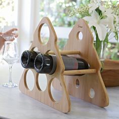 Add a festive flair to your home this season with the Tirrinia Countertop Wine Rack, a charming Christmas-themed wine holder that doubles as practical storage and stunning decoration. Shaped like a Christmas tree and crafted from thick, natural bamboo, this rack beautifully showcases up to six bottles of your finest wine. It’s perfect for adding a cozy holiday vibe to your bar, dining table, or shelves, while also saving valuable space. Holiday Gift Idea Looking for Christmas gift ideas or stand Bamboo Wine Rack, Stact Wine Rack, Counter Top Wood Wine Rack, Modern Farmhoise Wine Rack, Wine Glass And Bottle Holder Wood, Countertop Wine Rack, Wooden Toy Car, Wine Rack, Christmas Fun