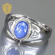 This vintage 10K gold signet ring showcases a striking star sapphire, complemented by diamond accents for added brilliance. Weighing 8g and sized at 11, it offers impressive finger coverage of 12.5mm and a rise of 8.2mm, creating a bold and commanding presence. Marked with "10k" and in great condition, this piece blends the unique charm of the star sapphire with the timeless appeal of a classic signet design, making it a standout addition to any jewelry collection. Karat: 10K Weight: 8 g Size: 11 Approximate measurement: Coverage:12.5 / Rise: 8.2 Stone(Approx. Size): Star Sapphire w/ Diamond Accents Marking: 10k  Condition: Great Approx Era: Vintage DELIVERY Our shipping and handling is always fast & free unless otherwise stated. Once an order is placed and payment is received, all items a Mens Ring Sizes, Gold Signet Ring, Star Sapphire, Men's Ring, Gold Star, Sapphire Diamond, Vintage Diamond, Unique Charms, Gold Stars