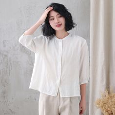 "Soft and comfy women linen blouse for summer, casual style blouse, loose fit size. Details: * linen shirt * rolled collar * 3/4 length sleeves * front button closure * loose and comfortable * causal women style * The model is 170cm (5′7″) tall with a 84cm (33\") bust, 66cm (26\") waist. She is wearing in size XS. Choose CUSTOM Order if you * Can't find your size in our size Chart * Your Height is not Between 5'1\" - 5\"9\" * Your weight is over 80kg SIZE GUIDE Size vary between Brand and Countr Relaxed Fit Plain Blouse, Plain Button-up Summer Blouse, Summer Relaxed Fit Plain Blouse, Solid Ramie Tops For Spring, Casual Linen Spring Blouse, Plain Linen Summer Top, Spring Linen Blouse With Buttons, Long Sleeve Ramie Blouse For Summer, Summer Long Sleeve Ramie Blouse