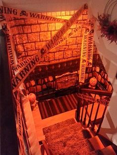 there are many halloween decorations on display in this house's staircases and stairs