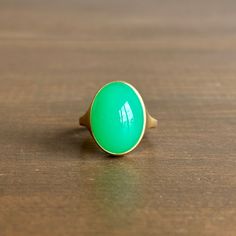 Refreshing green hues beam out from this splendid chrysoprase from Marlboro, Australia. 18k yellow gold Chrysoprase, 10.1ct, 12mm x 16mm (7/16" x 5/8") Green Oval Opal Ring, Classic Green Opal Cabochon Ring, Classic Green Oval Opal Ring, Green Oval Chalcedony Rings, Oval Green Chalcedony Rings, Gold Oval Chrysoprase Emerald Ring, Cast Rings, Newport Ri, Green Hues