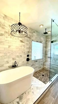 a bathroom with a large tub and walk in shower