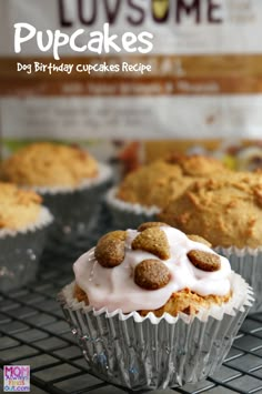 some cupcakes are sitting on a cooling rack