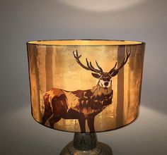 a lamp shade with an image of a deer on it