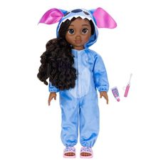 the doll is wearing a blue bunny suit and holding a toothbrush in her hand