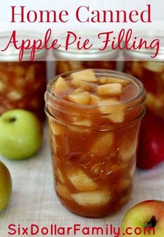 an apple pie filling in a mason jar with apples around it and text overlay that reads home canned apple pie filling