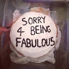 a cake with the words sorry 4 being fabulous written on it in frosting and icing