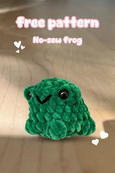 a small green stuffed animal sitting on top of a wooden table with the caption free pattern no - sew frog