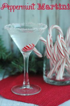 peppermint martini with candy canes on the side