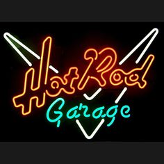 a neon sign that says hard rock garage