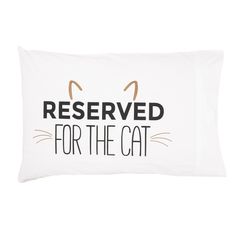 a white pillow with the words reserved for the cat on it's front and back